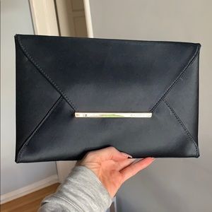 BCBG black satin & gold envelop clutch